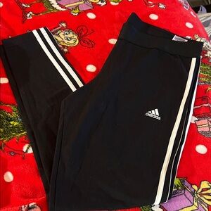 Adidas New woman’s Black leggings with White Stripes